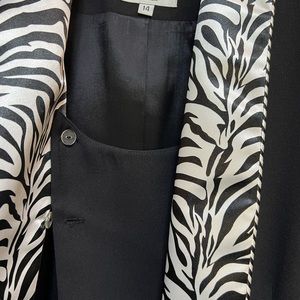 Beautiful black dressy jacket, black & white trim. Art decor rhinestone hooks.